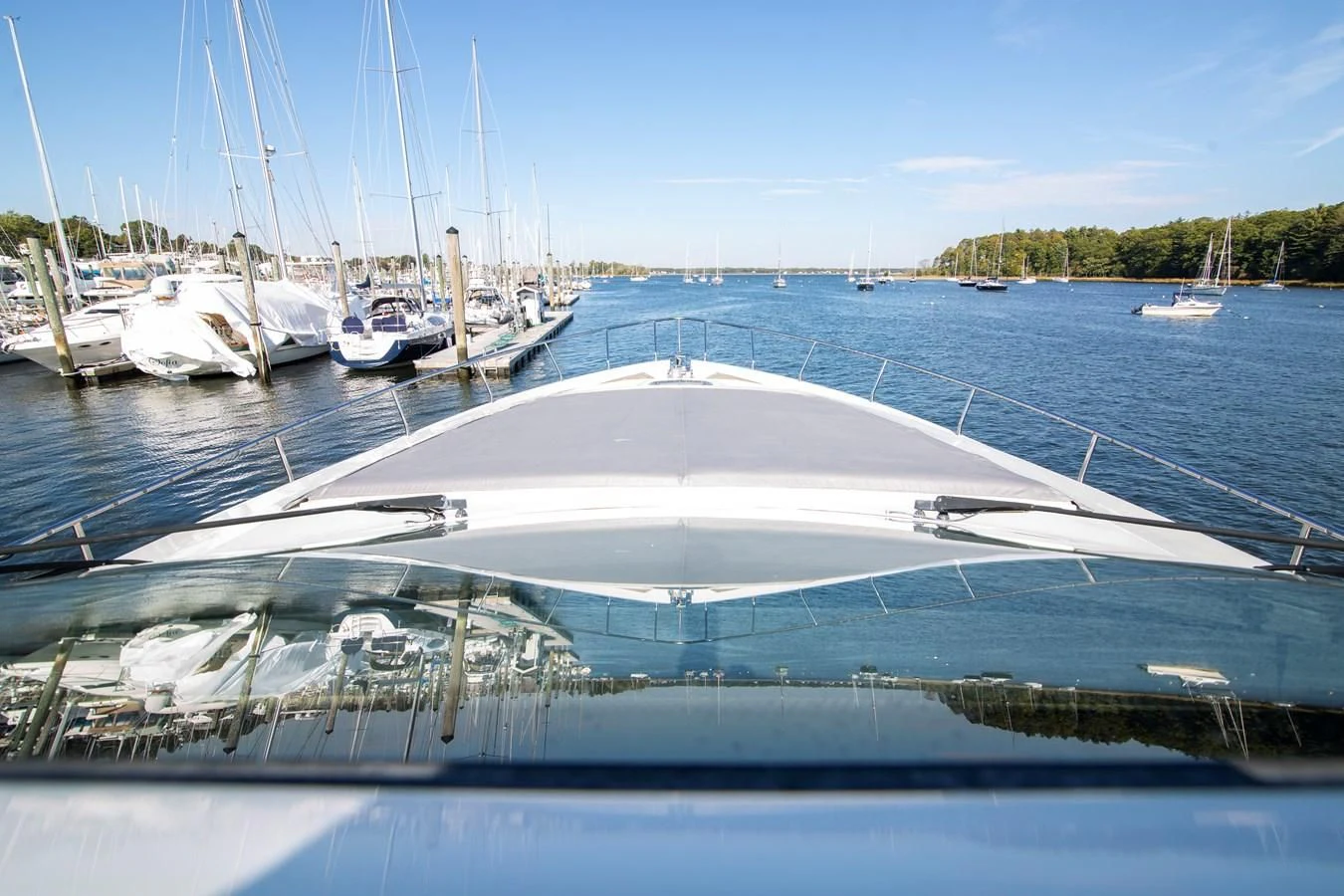 a group of boats in a harbor aboard UPTOWN GIRL Yacht for Sale