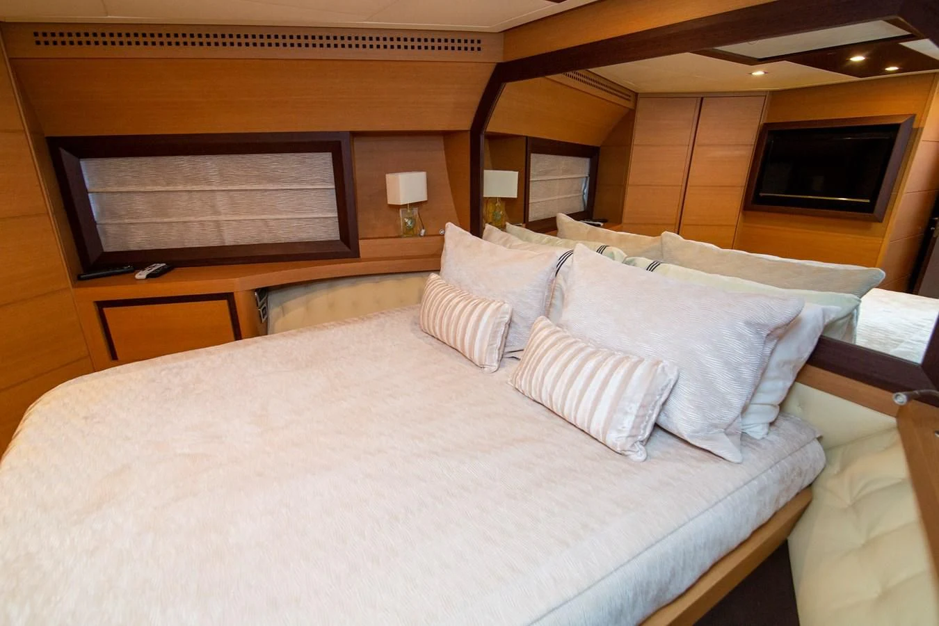 a bed with pillows aboard UPTOWN GIRL Yacht for Sale
