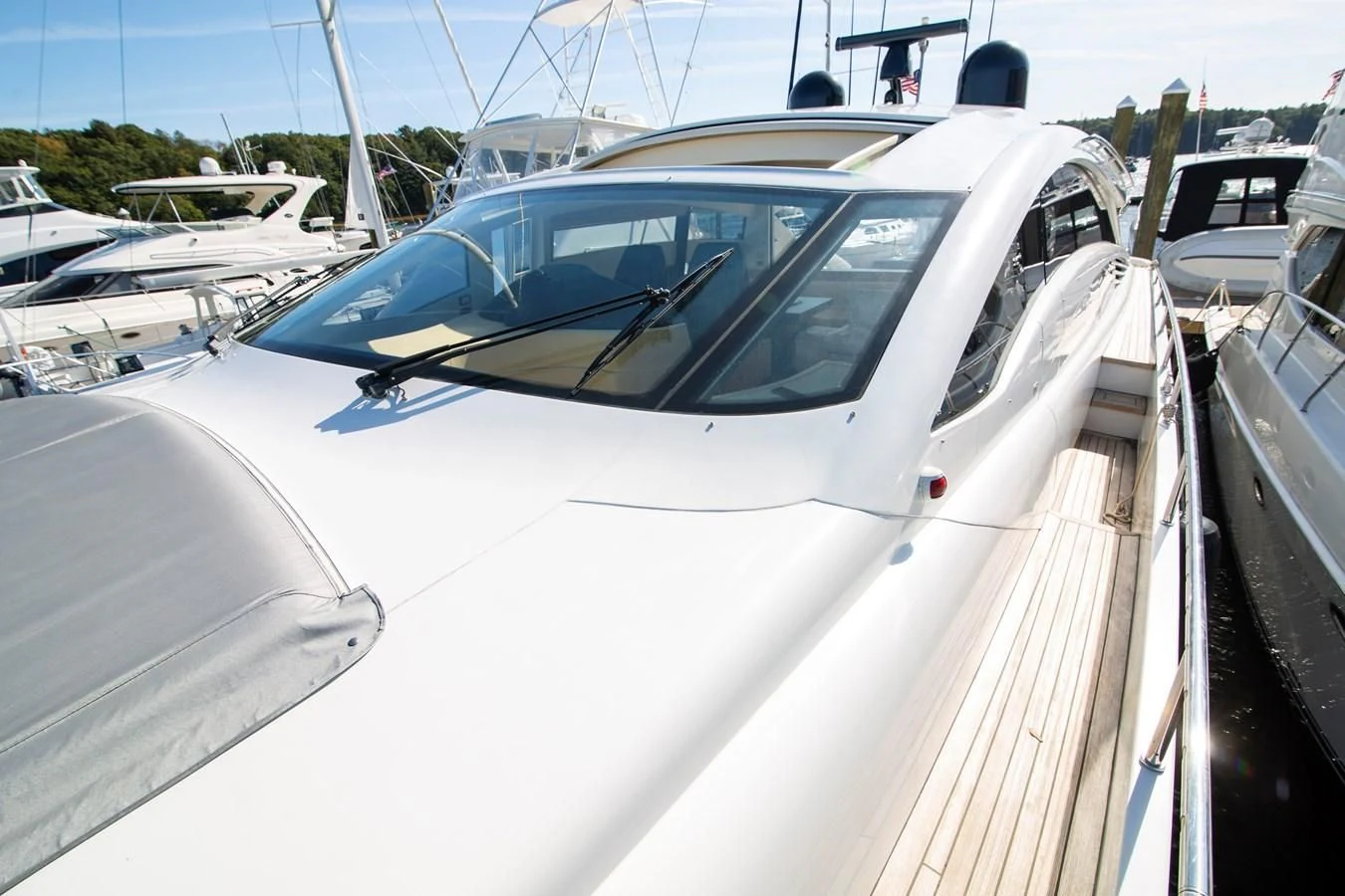 a white car with a door open aboard UPTOWN GIRL Yacht for Sale