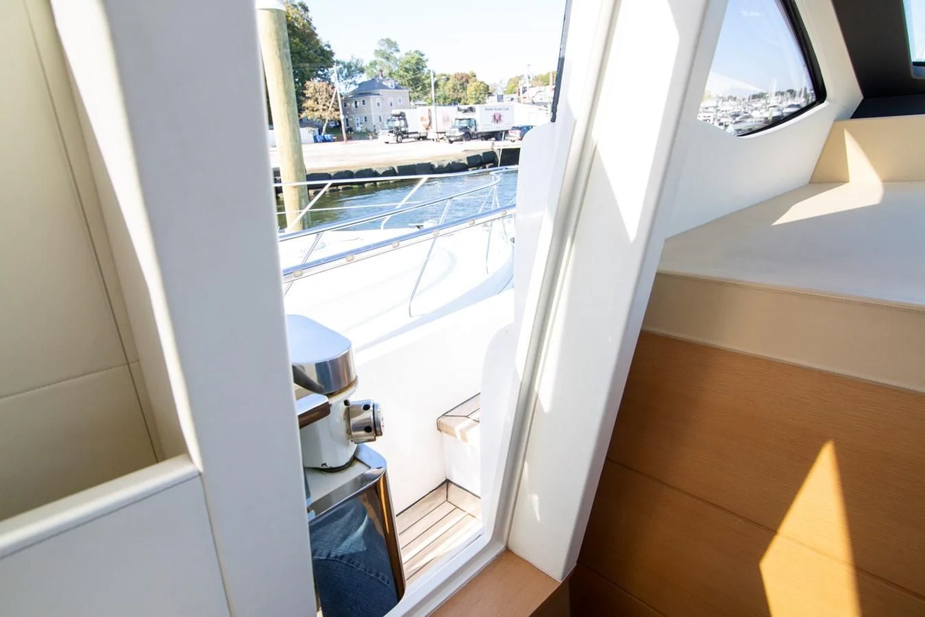 a window with a sink and a door with a window aboard UPTOWN GIRL Yacht for Sale