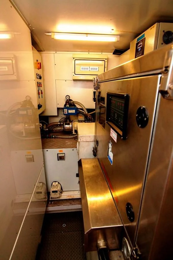 a machine in a room aboard UPTOWN GIRL Yacht for Sale