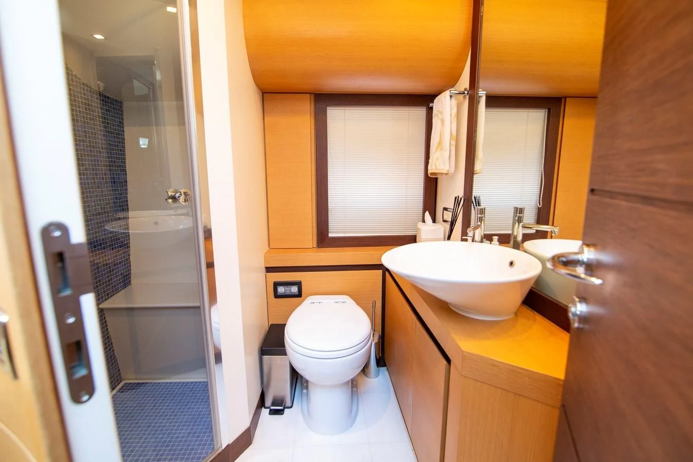 a bathroom with a sink toilet and a shower aboard UPTOWN GIRL Yacht for Sale