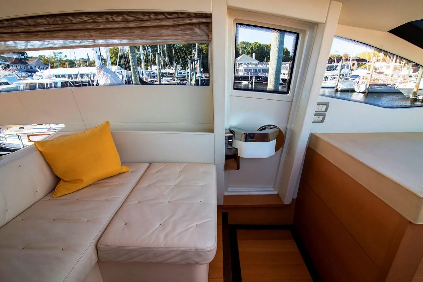 a room with a bed and a window aboard UPTOWN GIRL Yacht for Sale