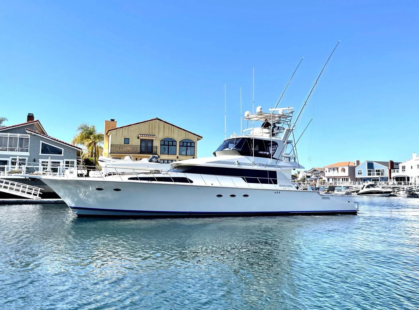 a boat on the water aboard AFTER MIDNIGHT Yacht for Sale