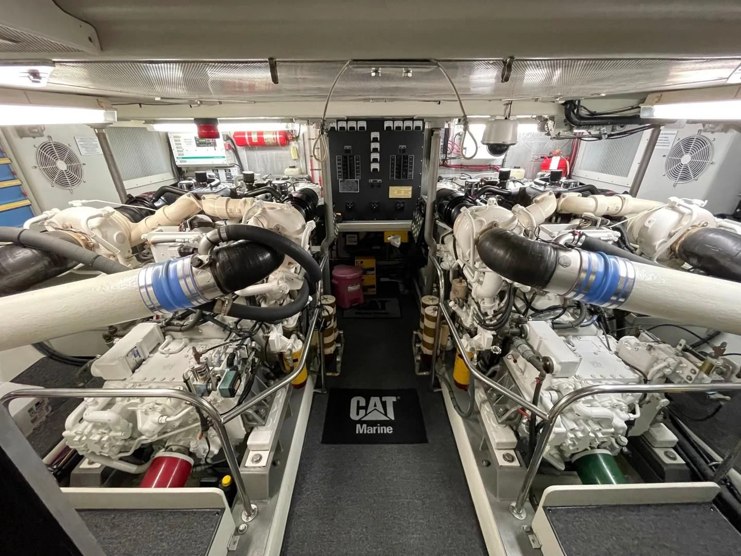 a room with many pipes and machinery aboard AFTER MIDNIGHT Yacht for Sale