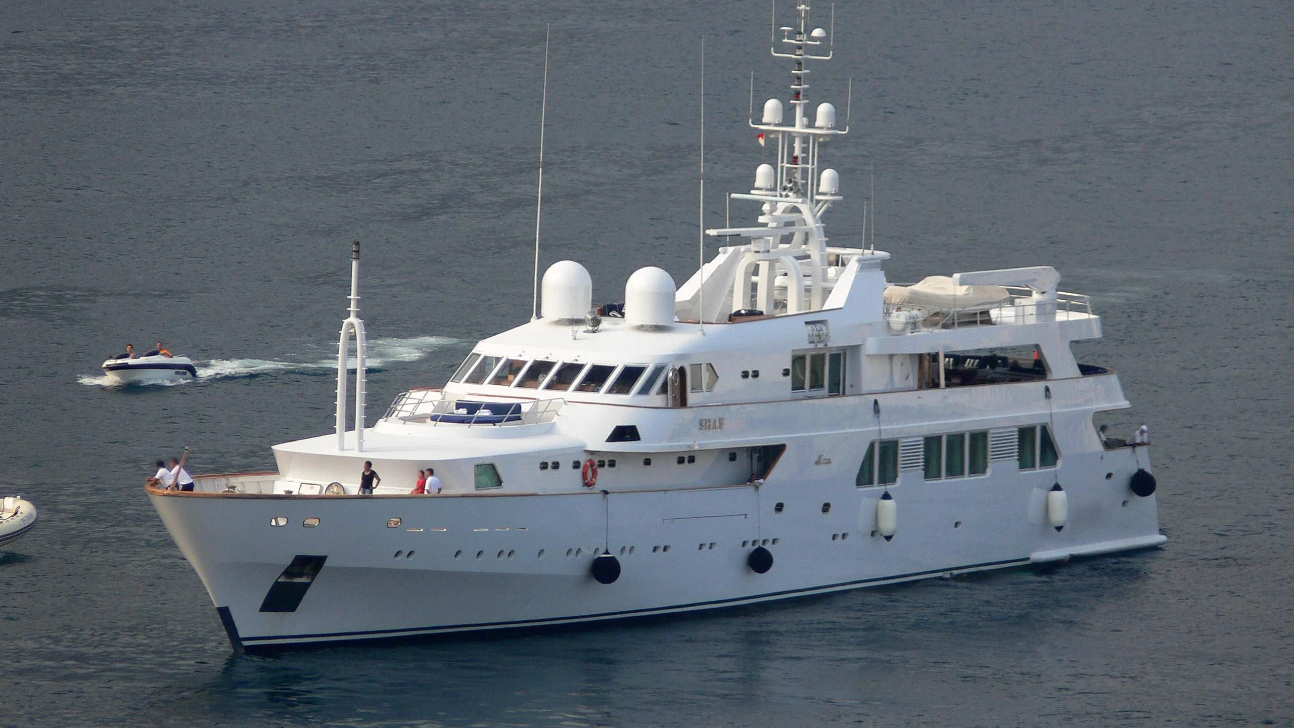 a large white boat aboard SUITE Yacht for Sale