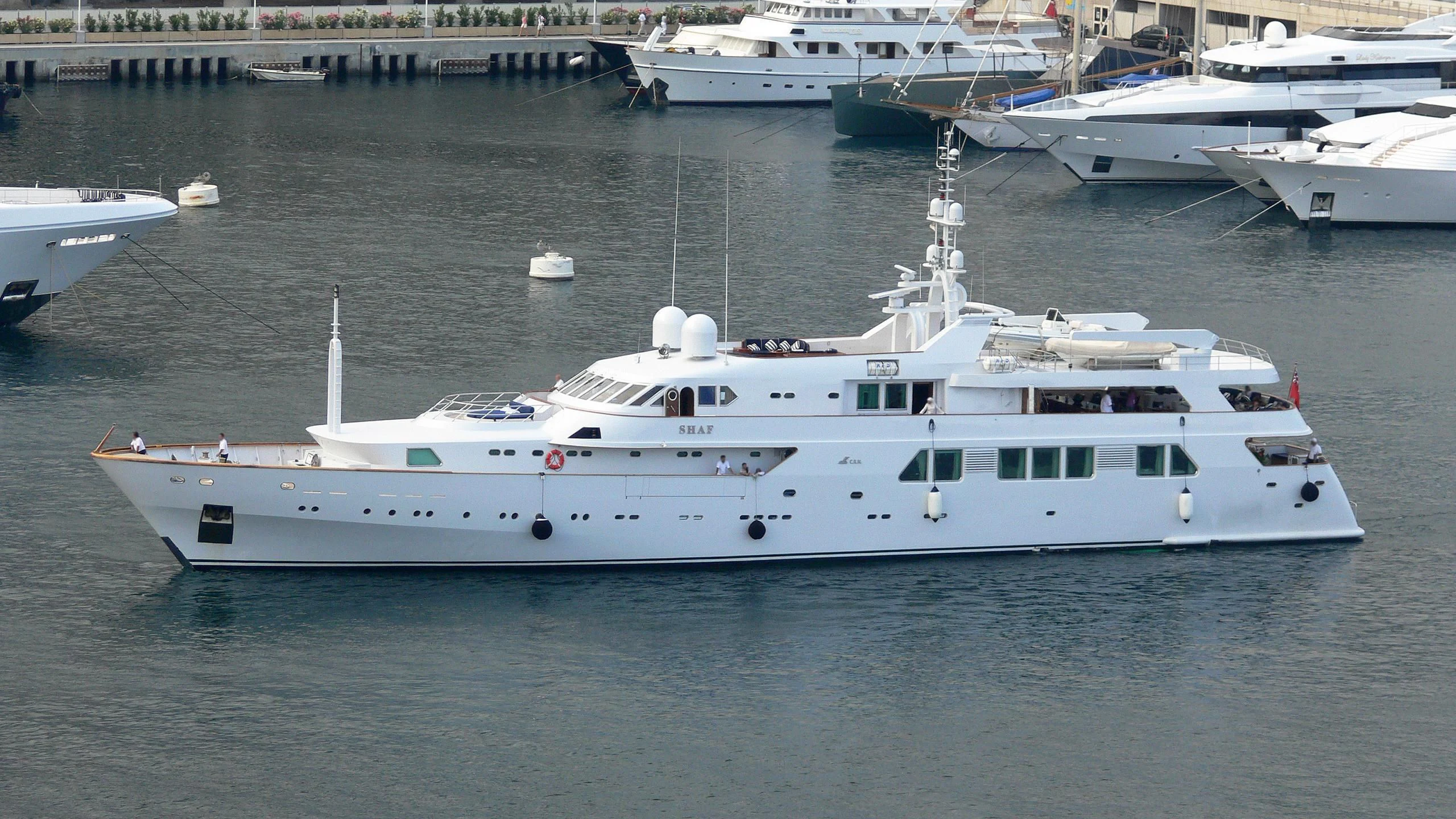 a group of boats in a harbor aboard SUITE Yacht for Sale