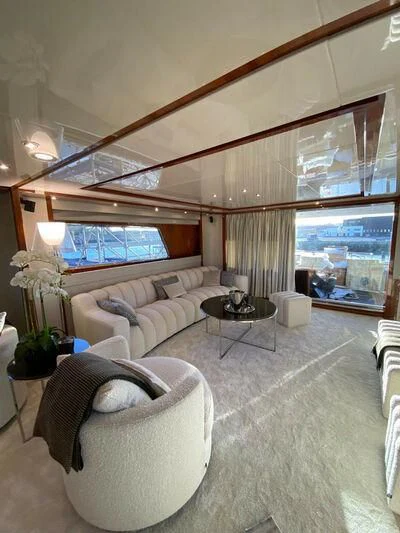 a living room with a large window aboard BY Yacht for Sale