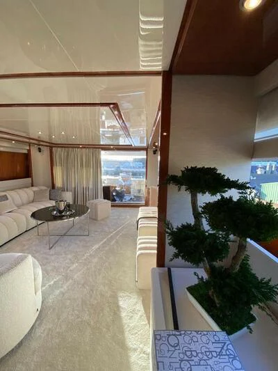 a room with a table and chairs aboard BY Yacht for Sale