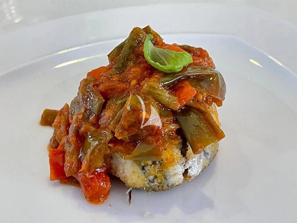 a plate of food aboard TANANAI Yacht for Sale