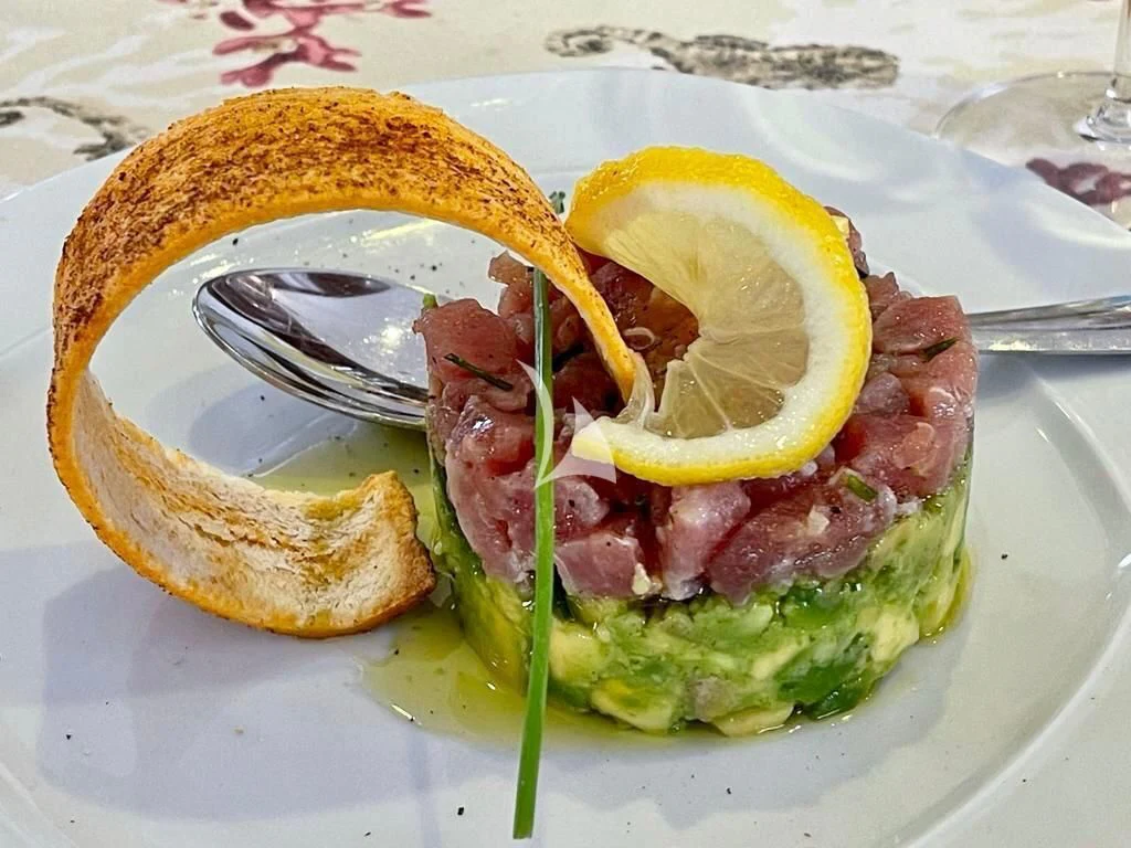 a plate of food aboard TANANAI Yacht for Sale