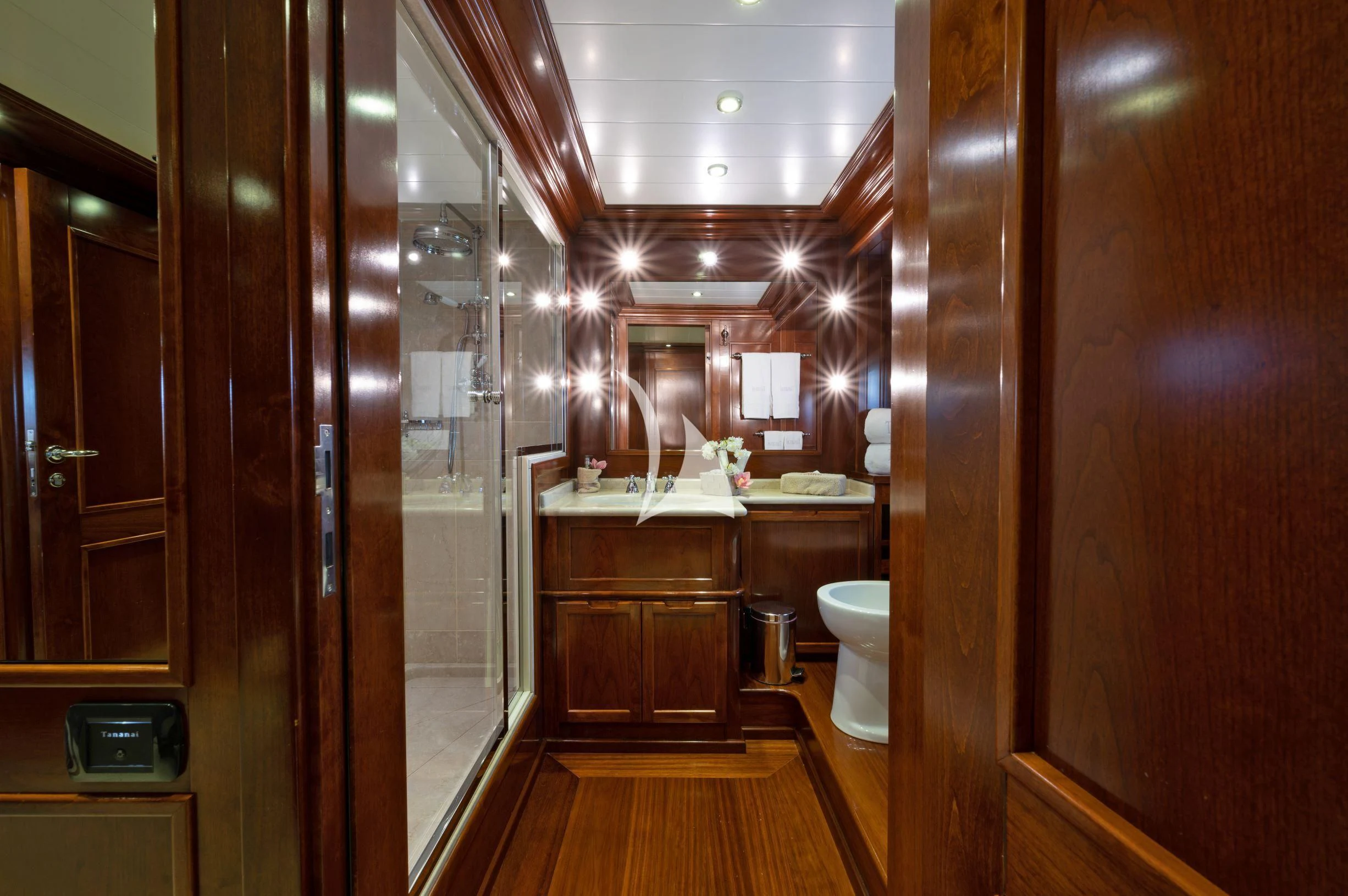 a bathroom with a standup shower aboard TANANAI Yacht for Sale