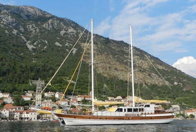 a sailboat in the water aboard WHITE SWAN Yacht for Sale