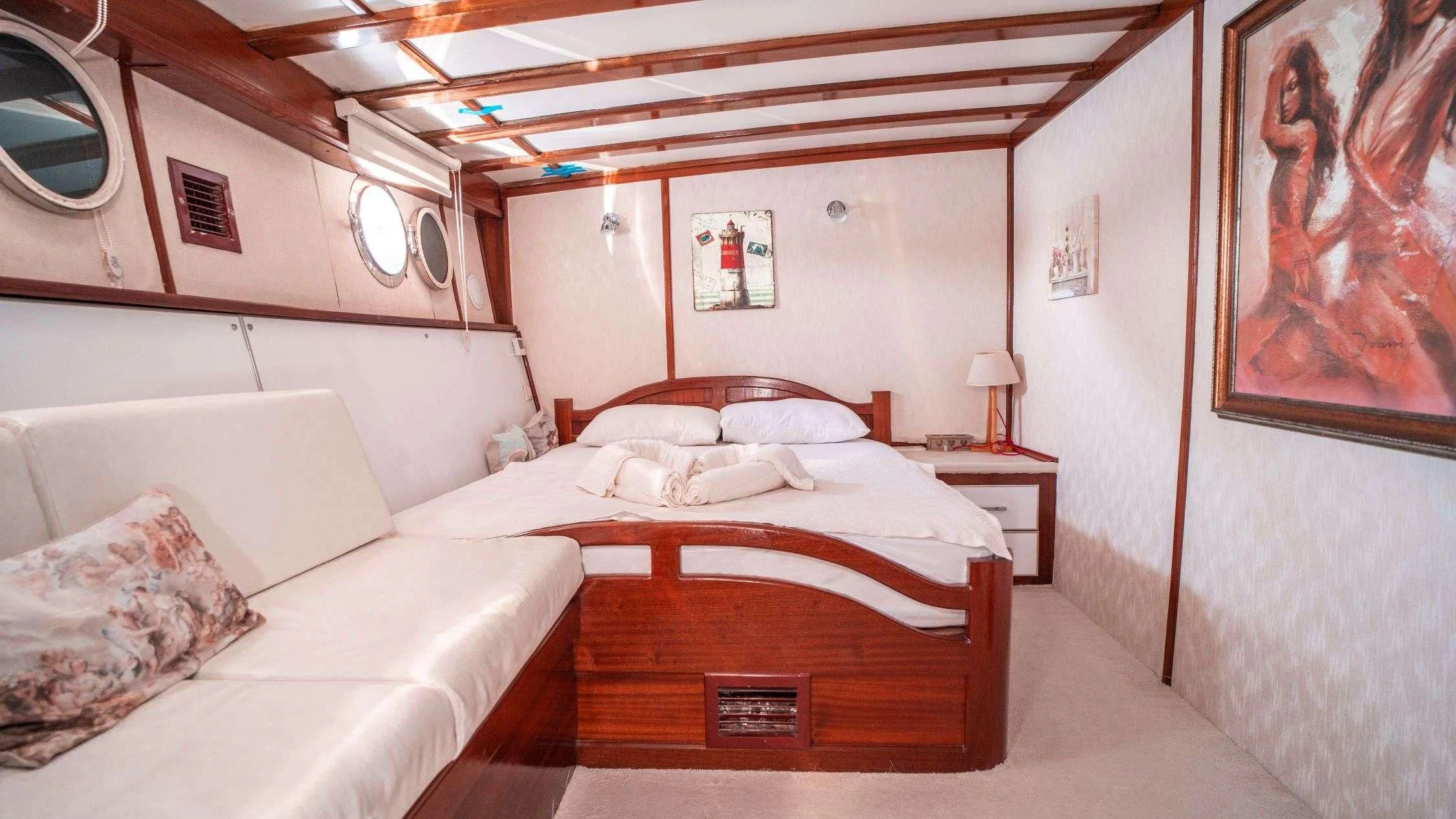 a room with two beds aboard WHITE SWAN Yacht for Sale