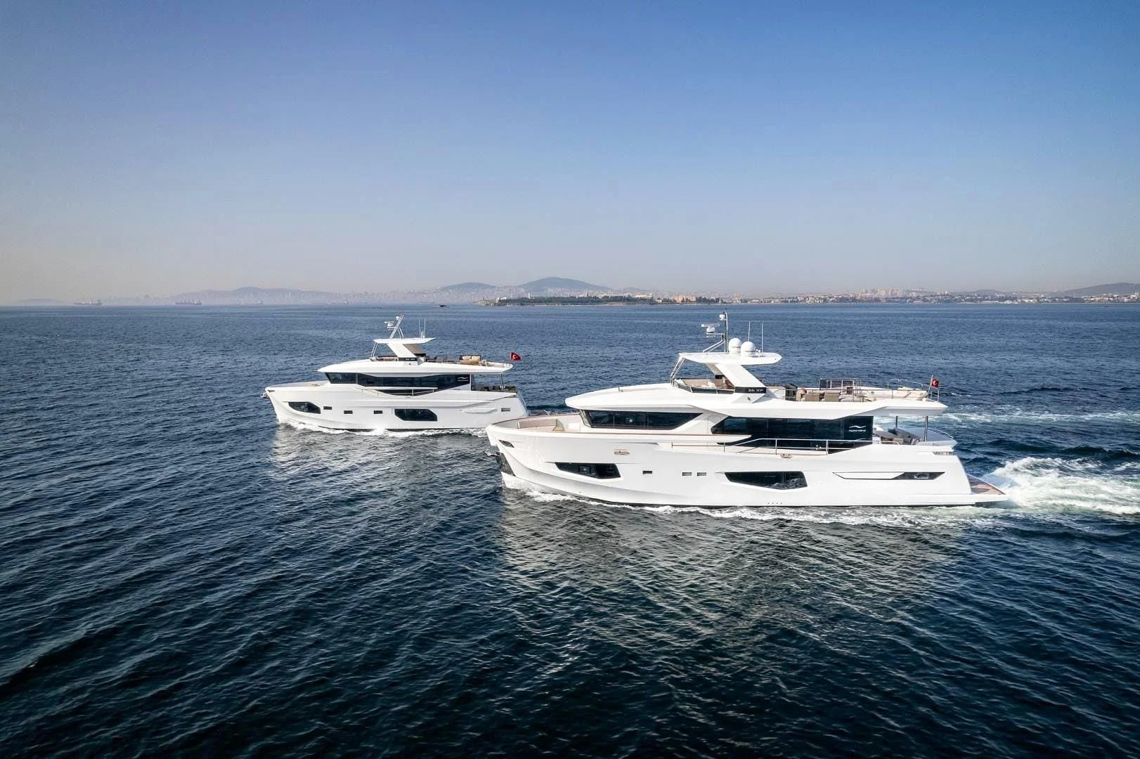 a group of boats in the water aboard NUMARINE 22XP/07 Yacht for Sale