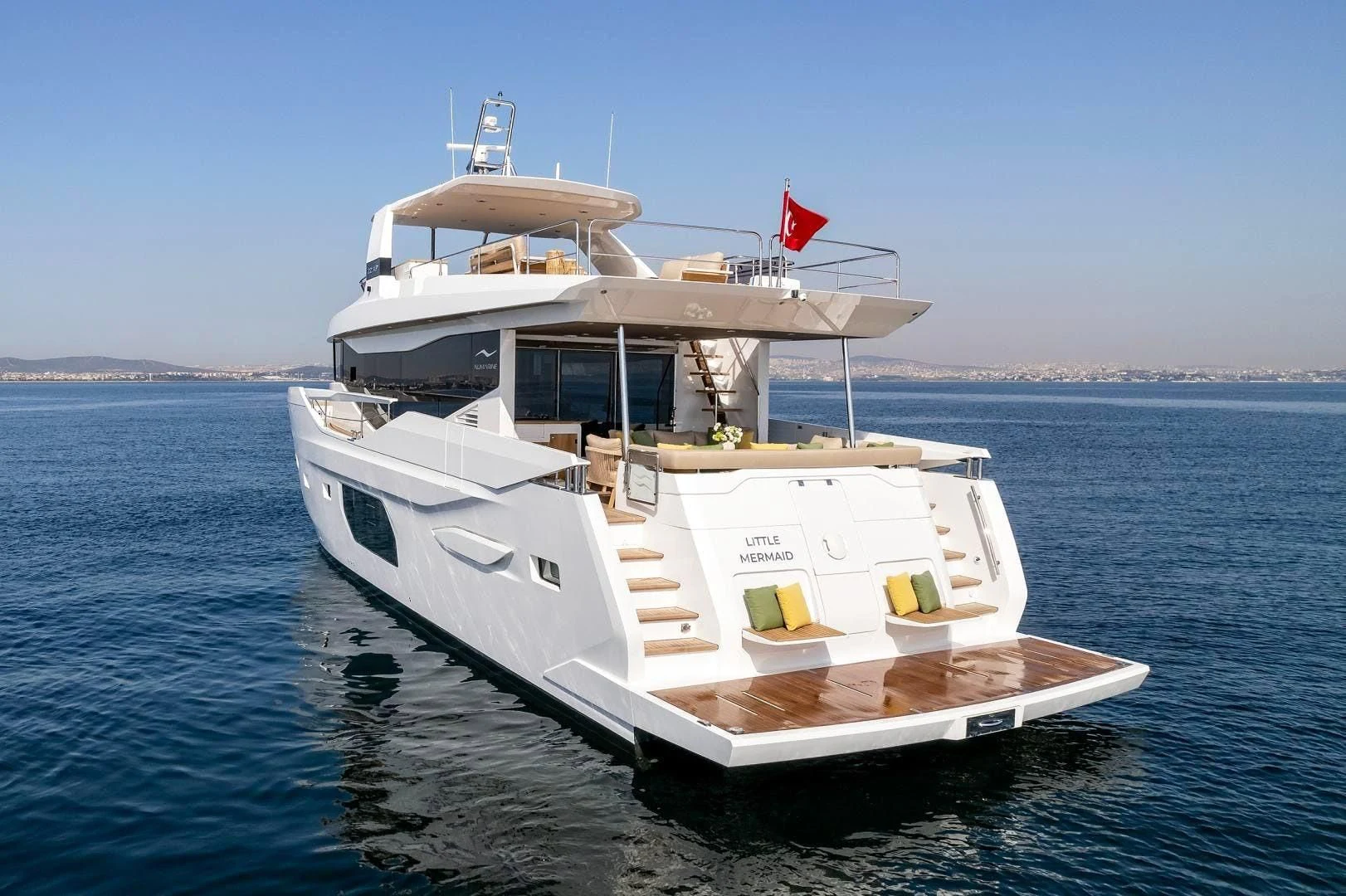 a boat on the water aboard NUMARINE 22XP/07 Yacht for Sale