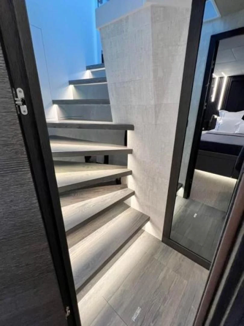a staircase in a room aboard NUMARINE 22XP/07 Yacht for Sale