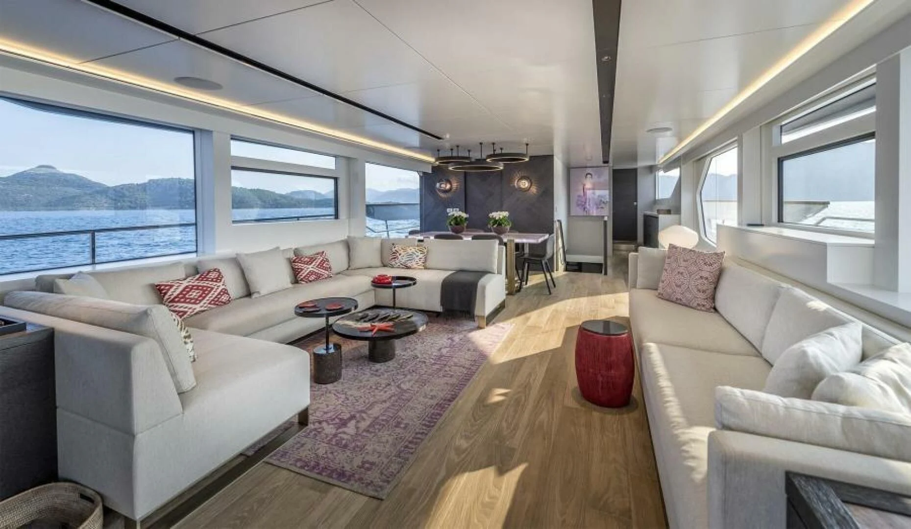a living room with a large window aboard NUMARINE 22XP/07 Yacht for Sale