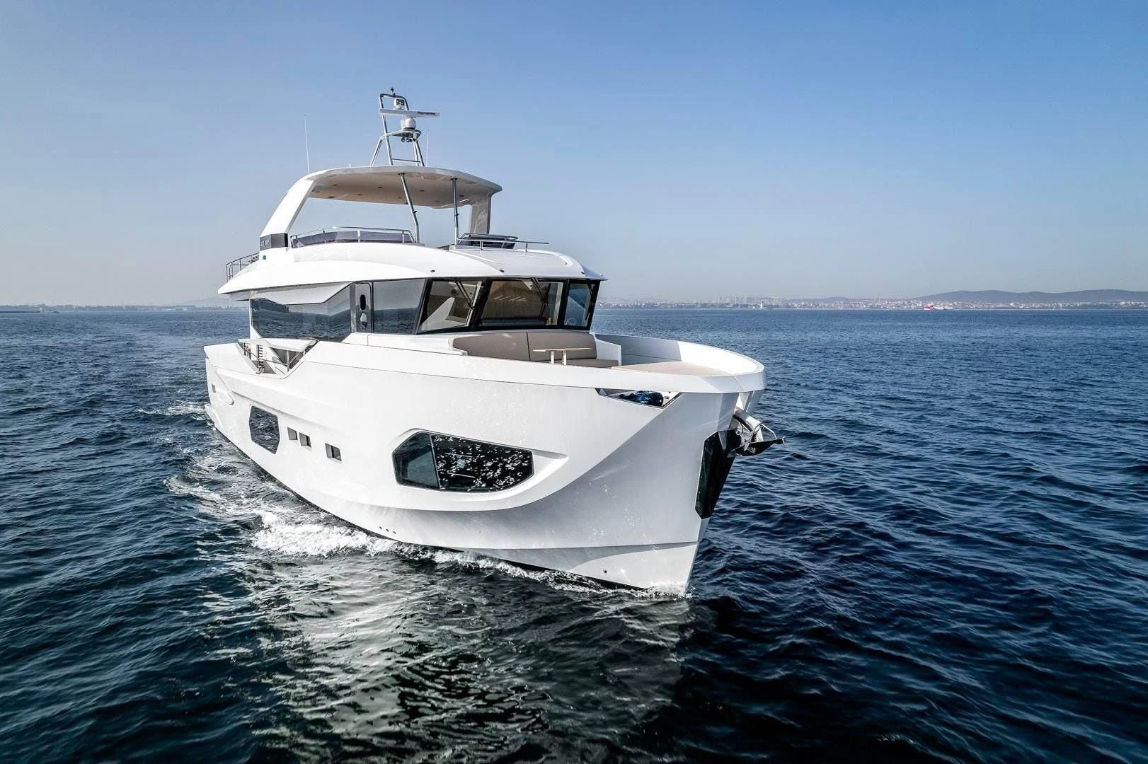 a white yacht on the water aboard NUMARINE 22XP/07 Yacht for Sale