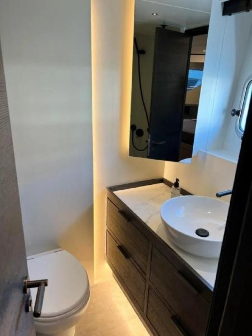 a bathroom with a sink and a toilet aboard NUMARINE 22XP/07 Yacht for Sale