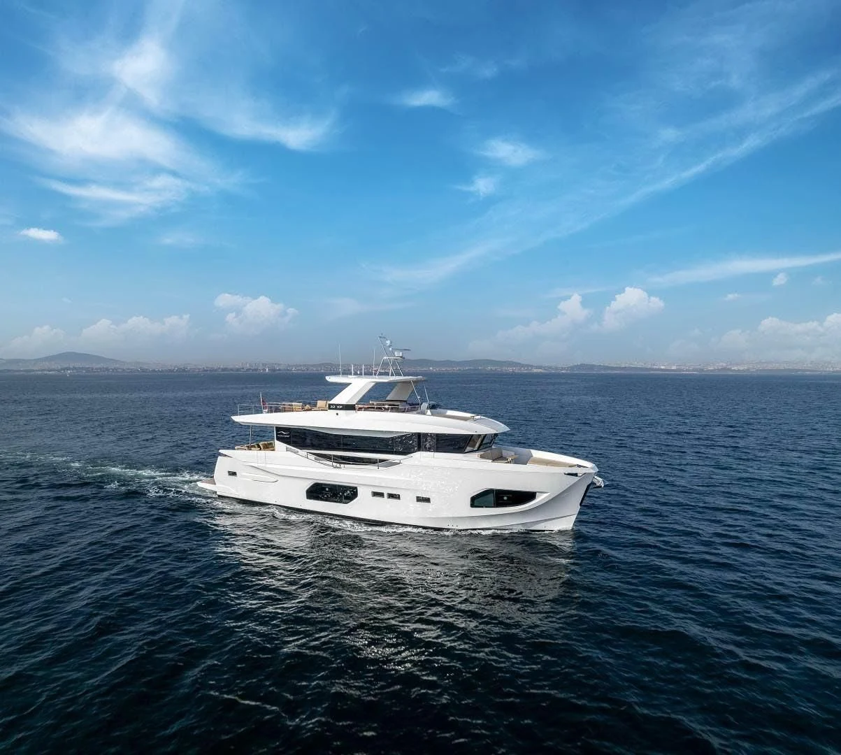 a boat on the water aboard NUMARINE 22XP/07 Yacht for Sale