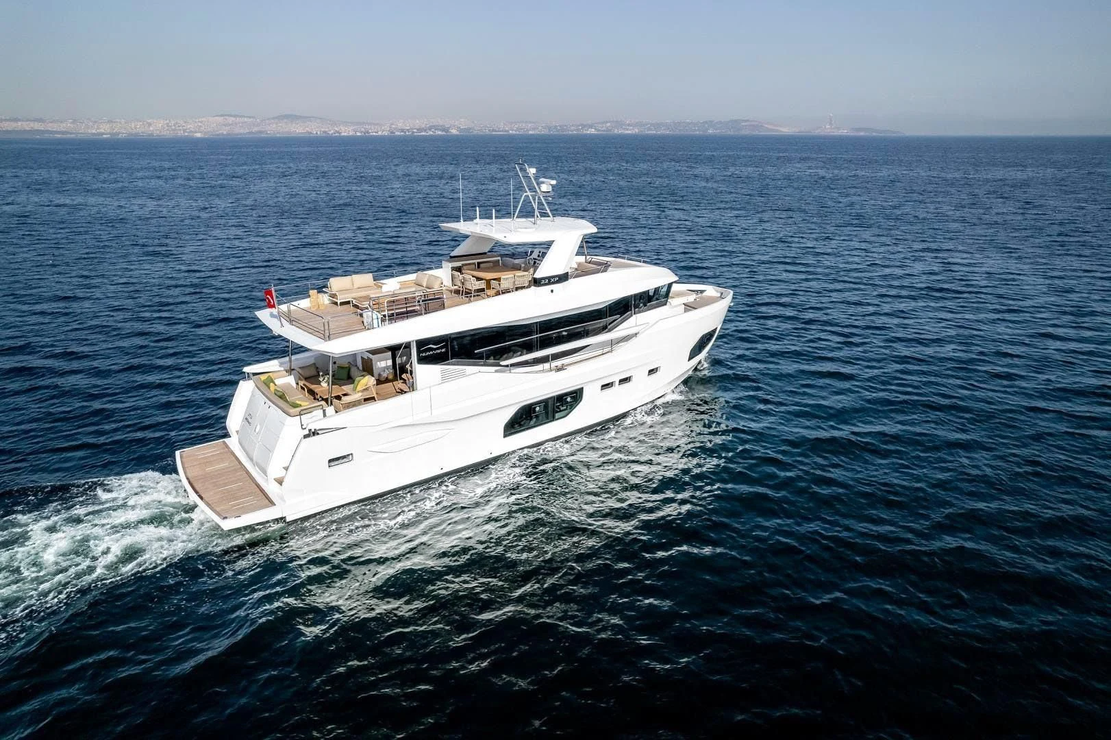 a boat on the water aboard NUMARINE 22XP/07 Yacht for Sale