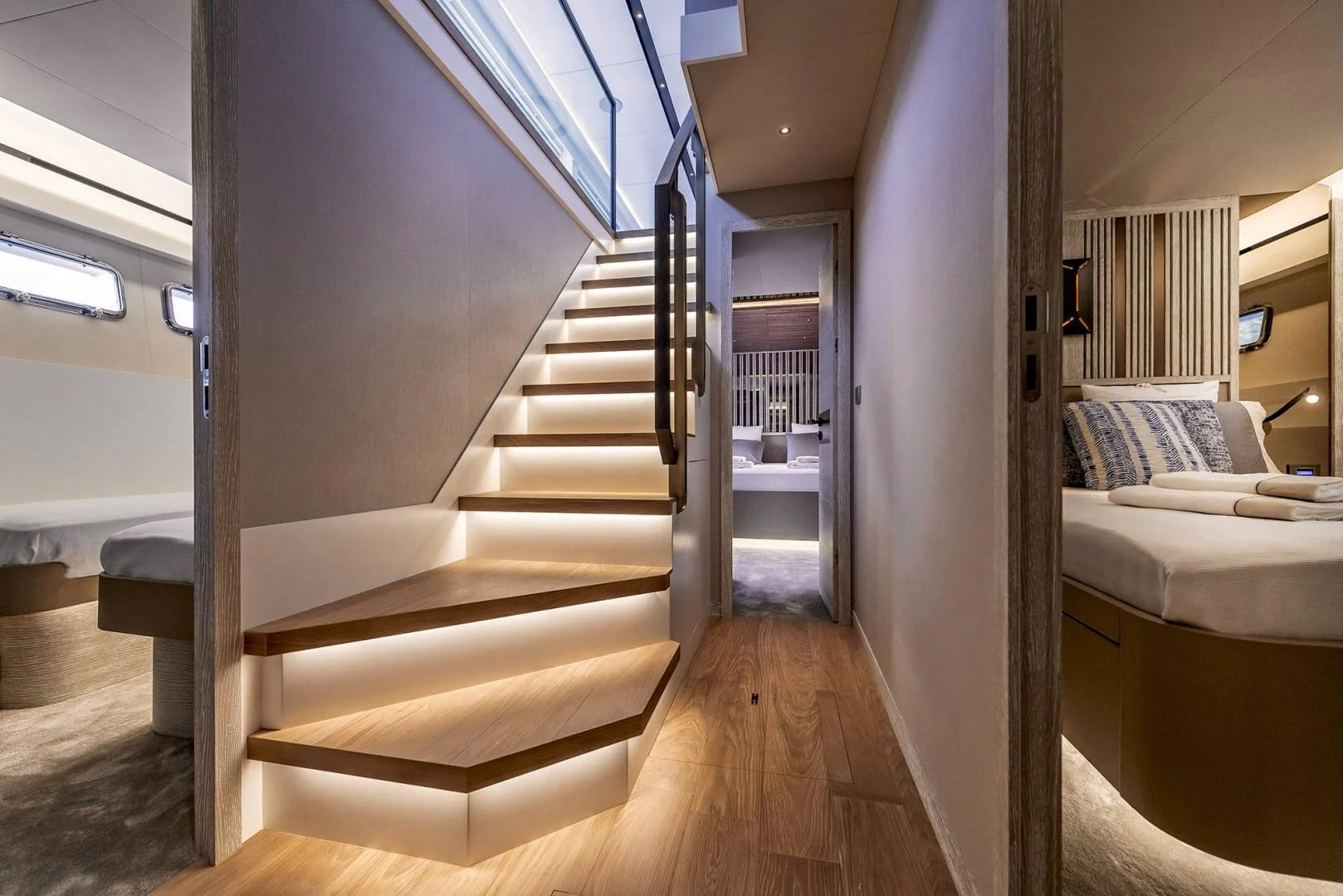 a room with a staircase and a bed aboard NUMARINE 22XP/07 Yacht for Sale