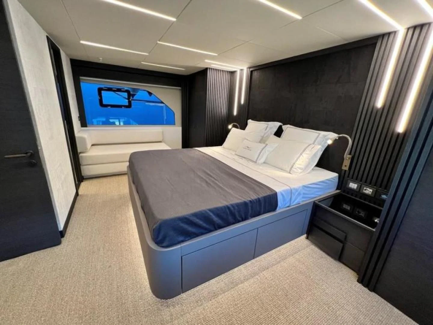a bed in a room aboard NUMARINE 22XP/07 Yacht for Sale
