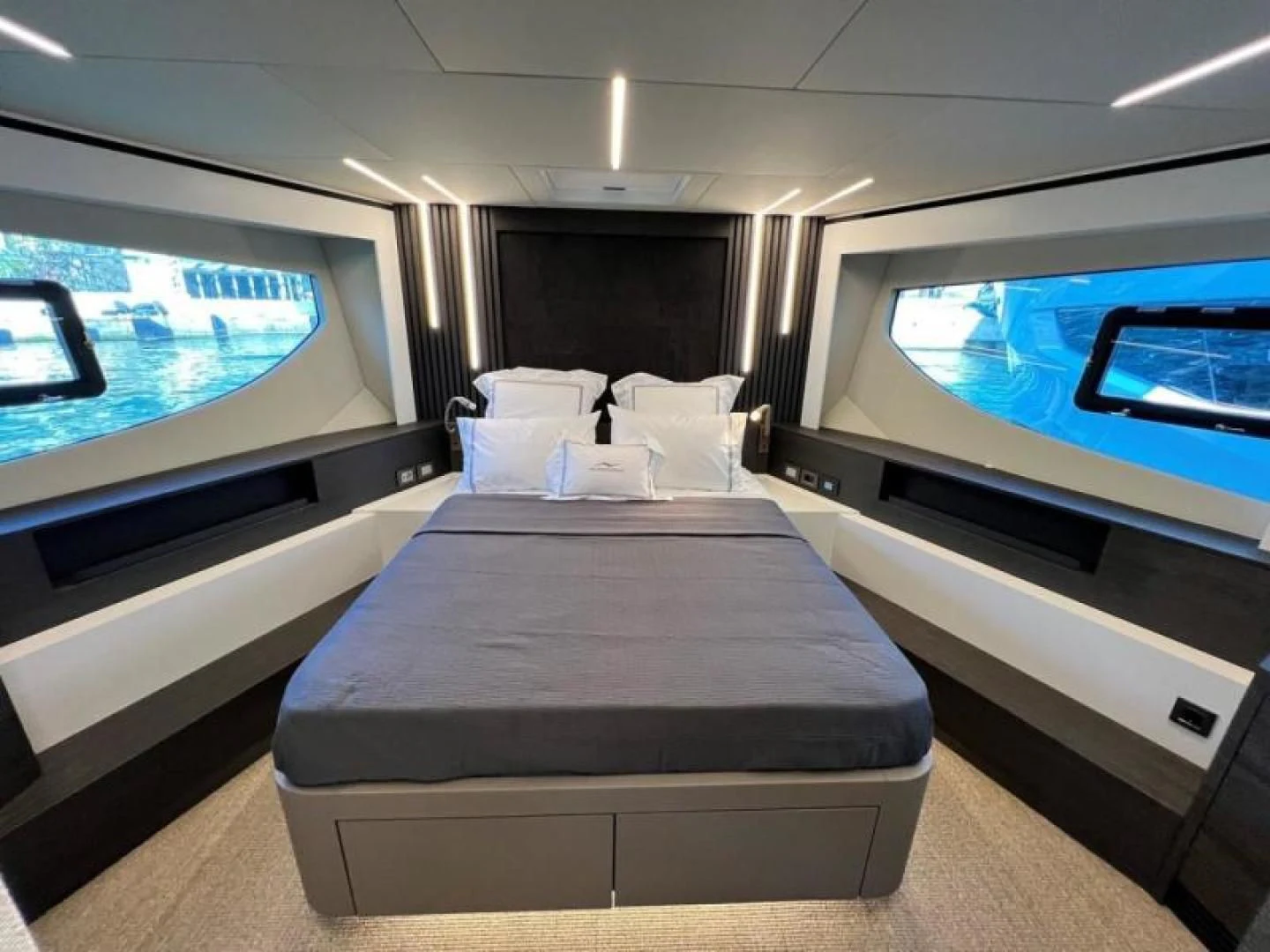 a bed in a room aboard NUMARINE 22XP/07 Yacht for Sale