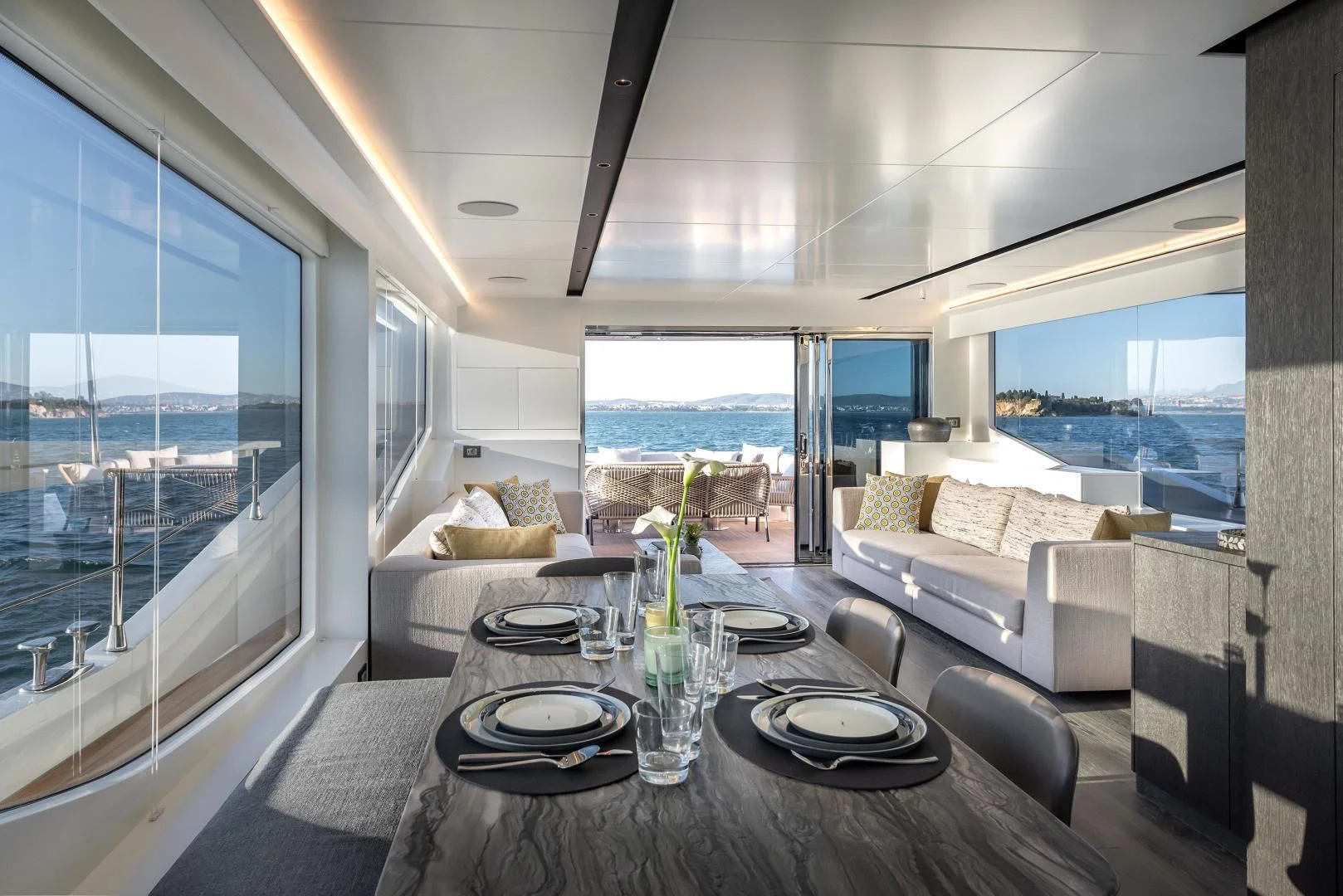 a large living room with a large window aboard NUMARINE 22XP/07 Yacht for Sale