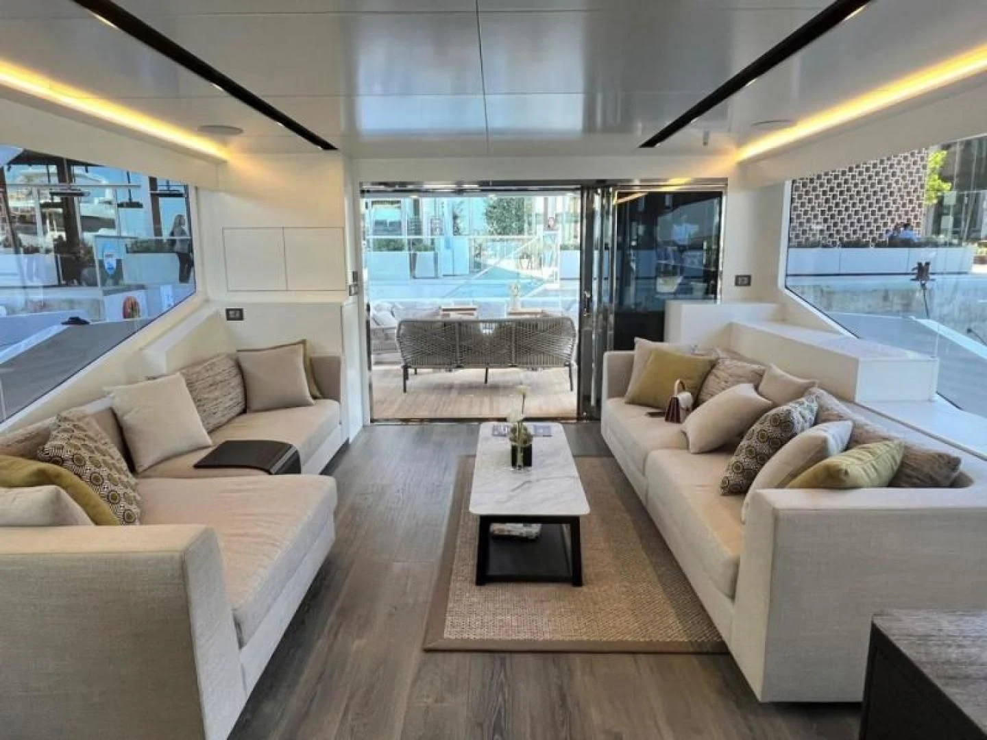 a living room with a large window aboard NUMARINE 22XP/07 Yacht for Sale