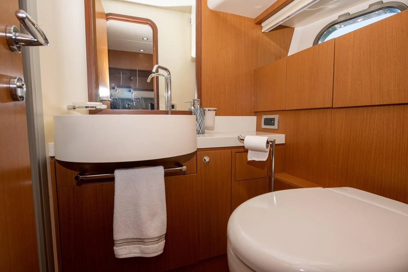 a bathroom with a sink and a bathtub aboard HOPE Yacht for Sale