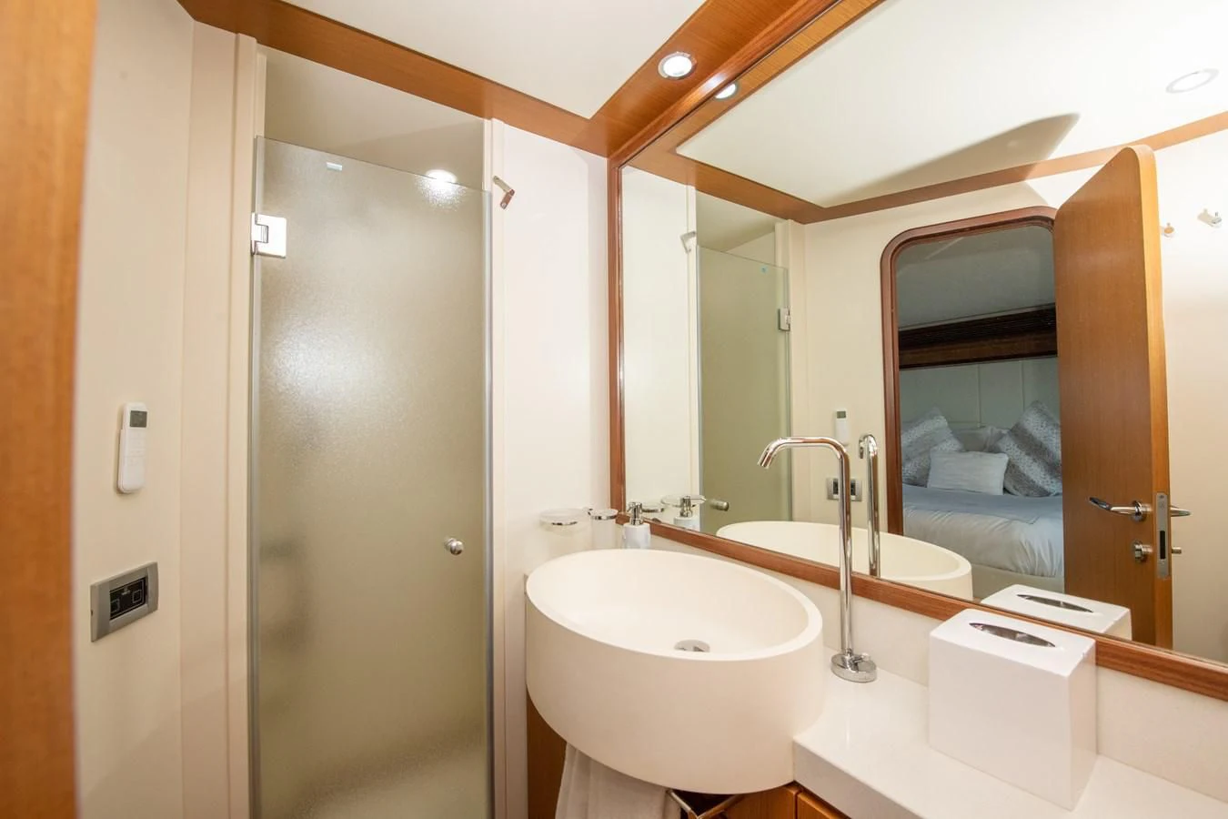 a bathroom with a large mirror aboard HOPE Yacht for Sale