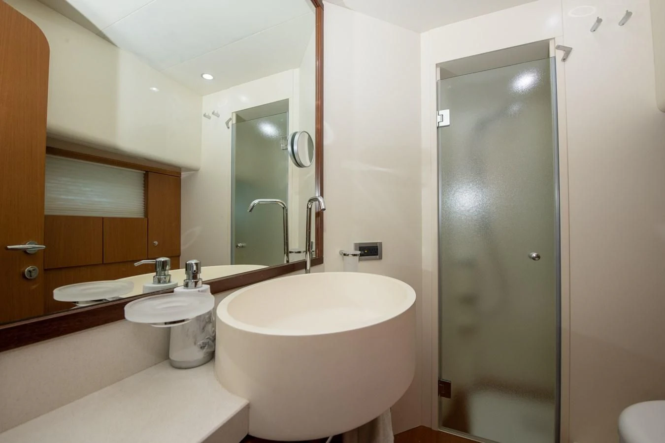 a bathroom with a sink and a shower aboard HOPE Yacht for Sale