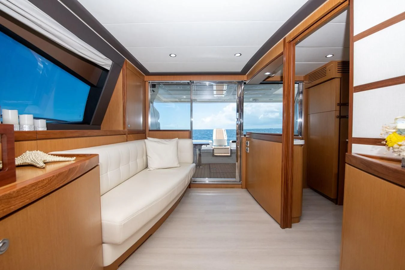 a room with a couch and a tv aboard HOPE Yacht for Sale
