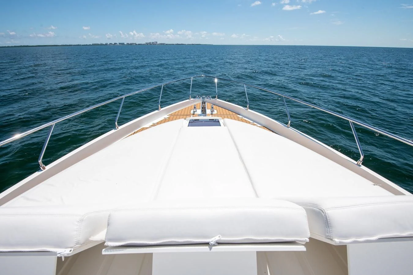 a white boat on the water aboard HOPE Yacht for Sale