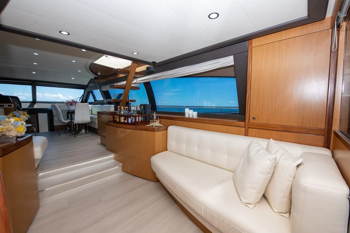 a room with a couch and a tv aboard HOPE Yacht for Sale