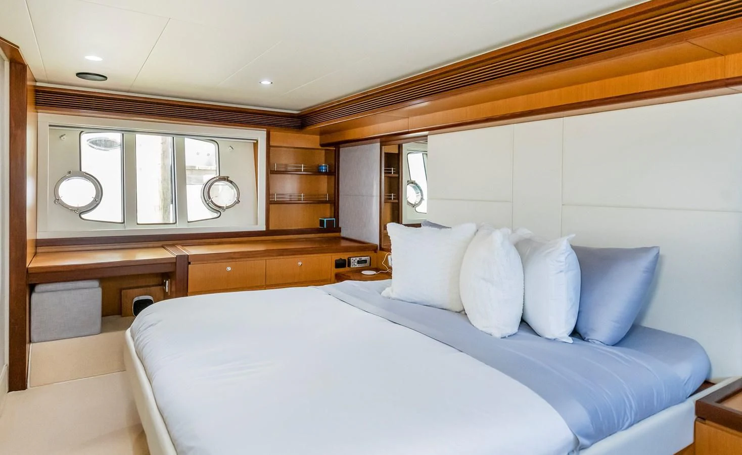 a bed with pillows aboard HOPE Yacht for Sale