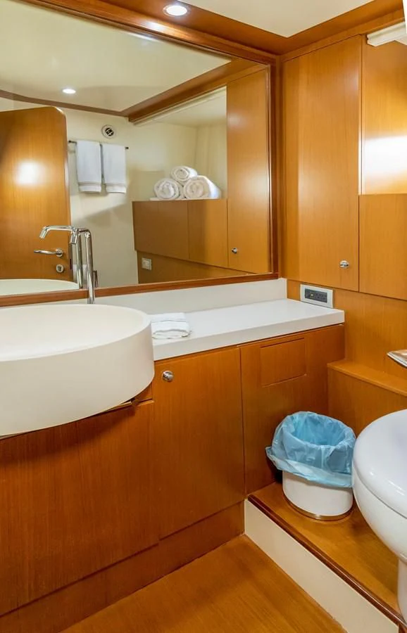 a bathroom with a sink and a mirror aboard HOPE Yacht for Sale