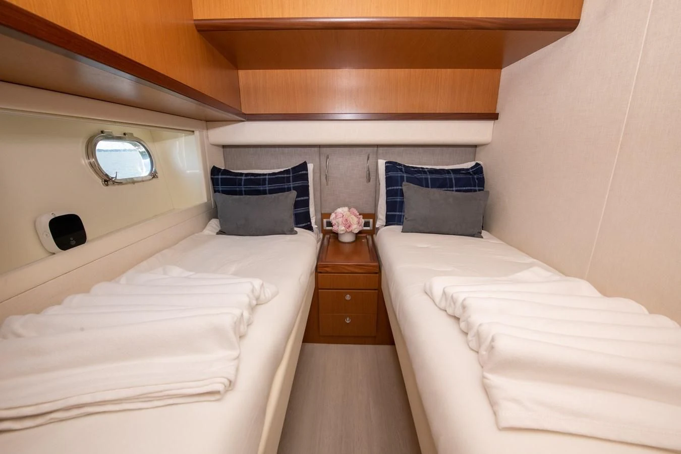 a room with a couple of beds aboard HOPE Yacht for Sale