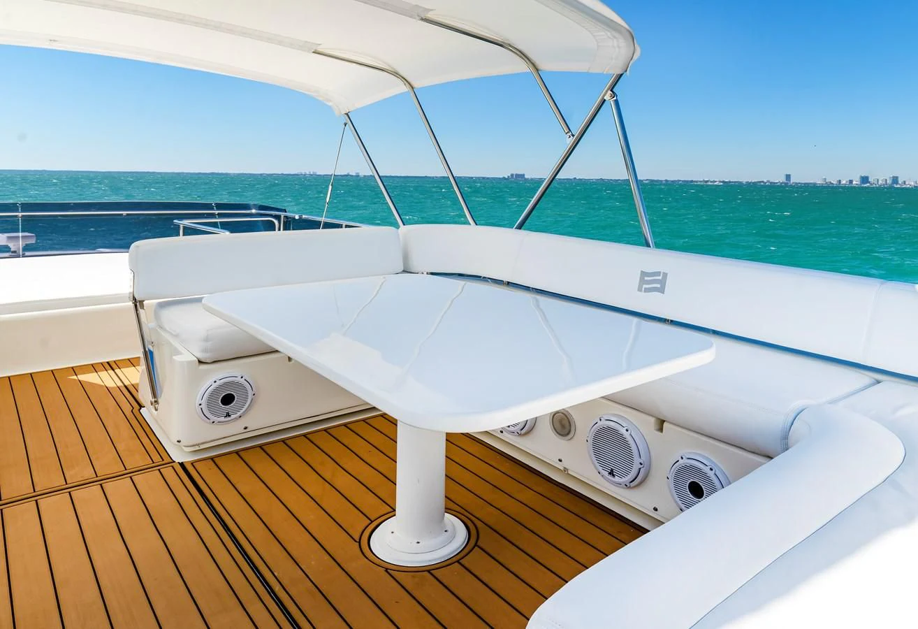 a white boat on a deck aboard HOPE Yacht for Sale