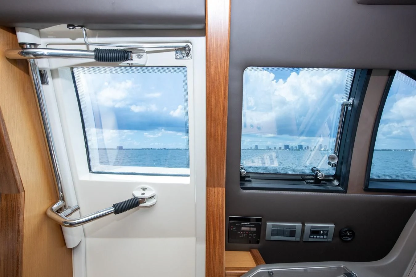 a view of a plane window aboard HOPE Yacht for Sale