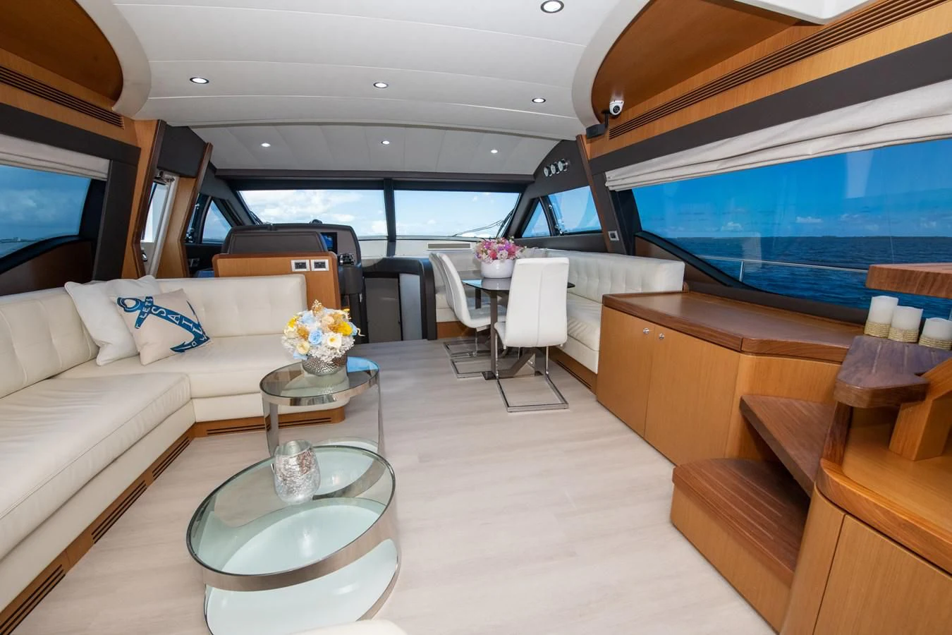 a living room with a large window aboard HOPE Yacht for Sale