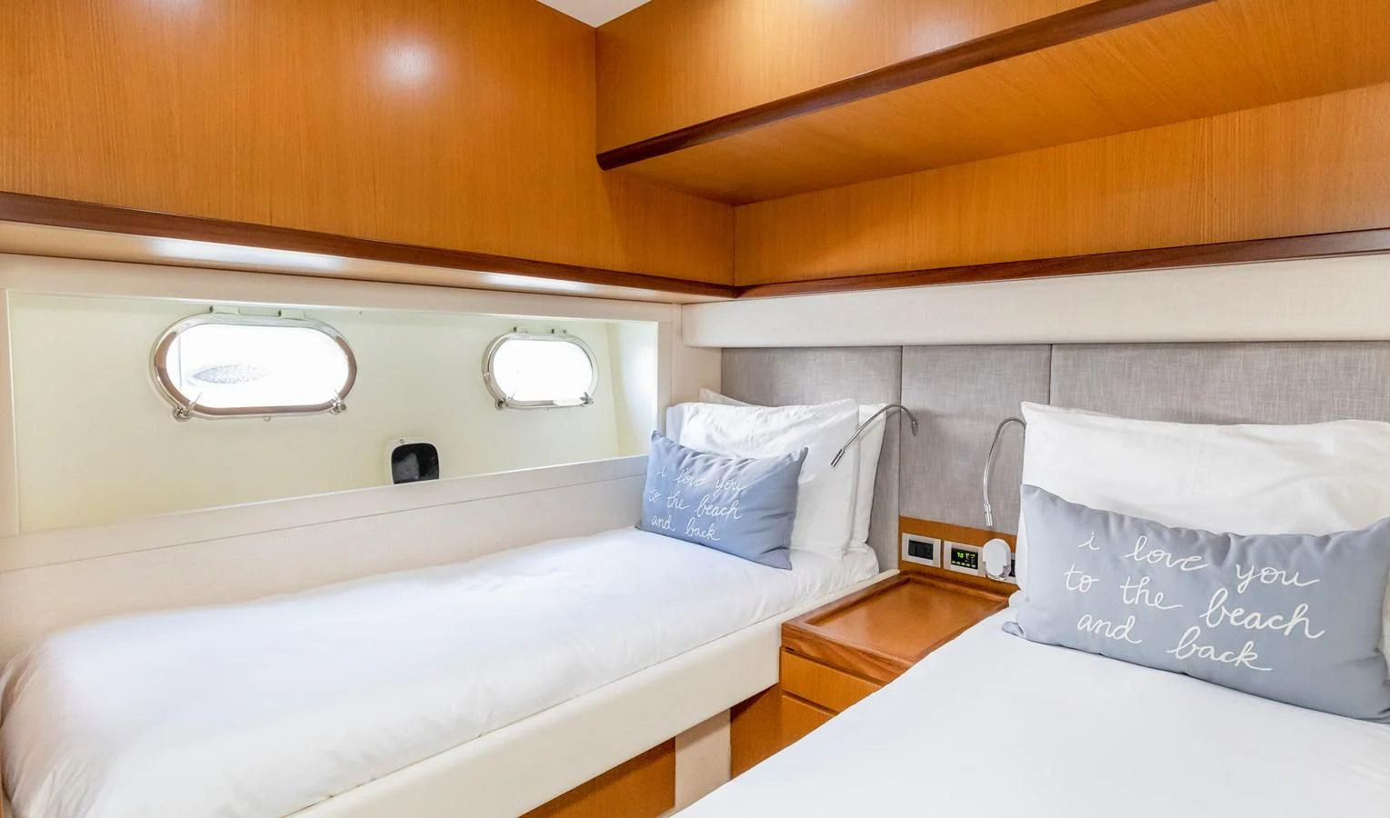a room with two beds aboard HOPE Yacht for Sale