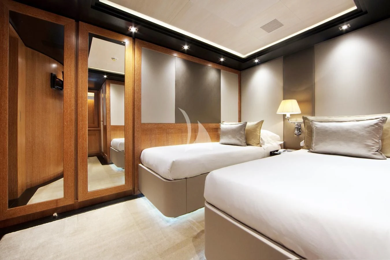a hotel room with two beds aboard BEATRIX Yacht for Sale