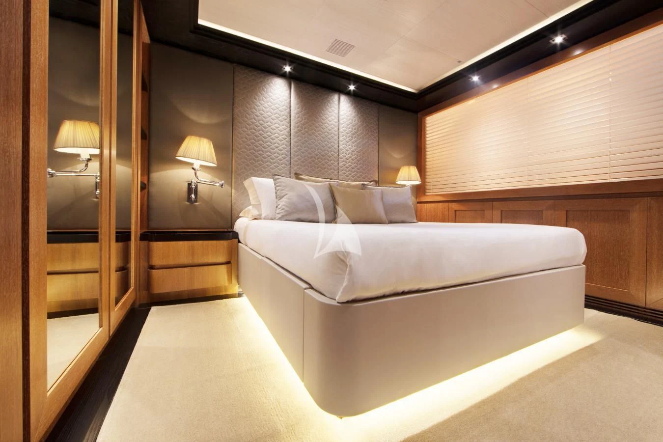 a bed in a room aboard BEATRIX Yacht for Sale