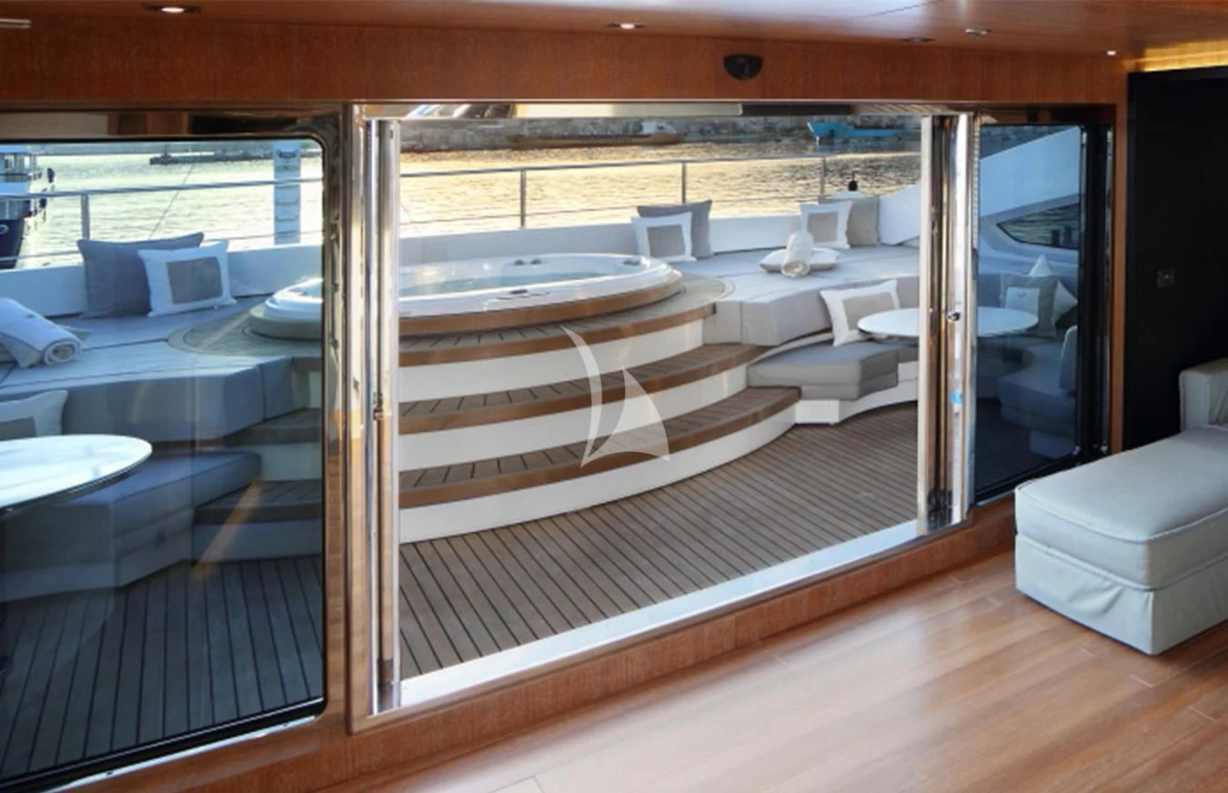 a room with a bed and a table aboard BEATRIX Yacht for Sale