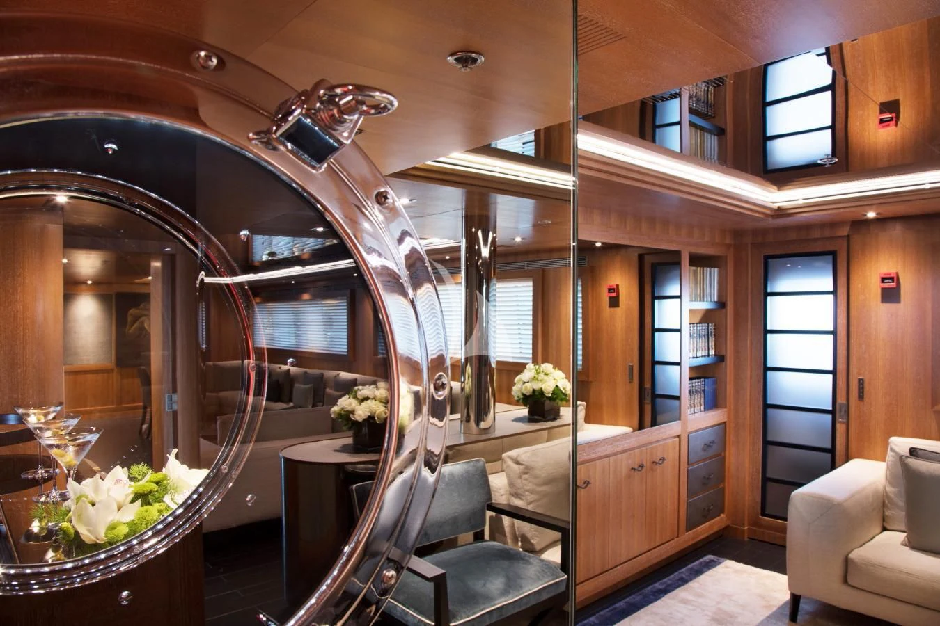 a room with a mirror and a table aboard BEATRIX Yacht for Sale