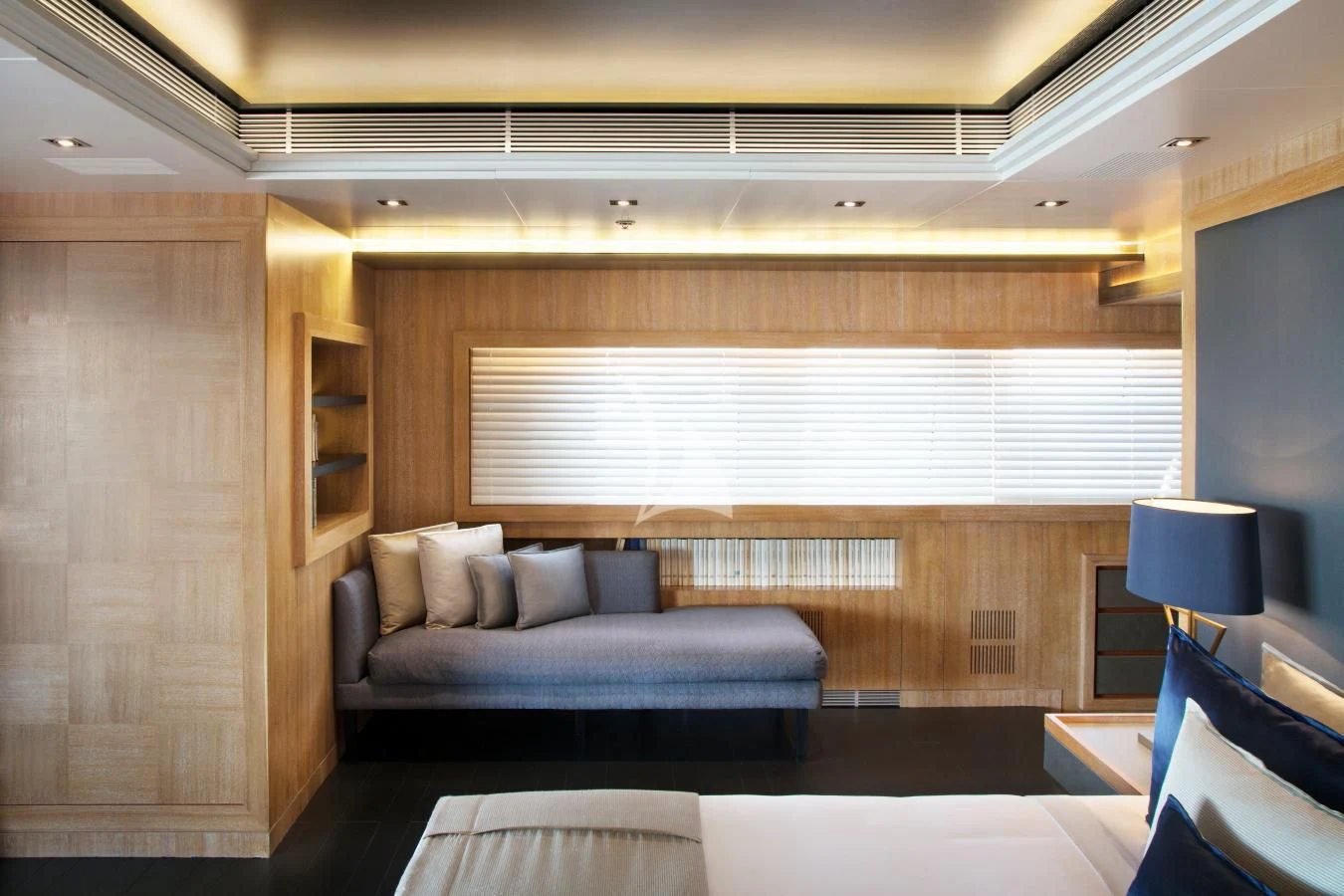 a room with a couch and a window aboard BEATRIX Yacht for Sale