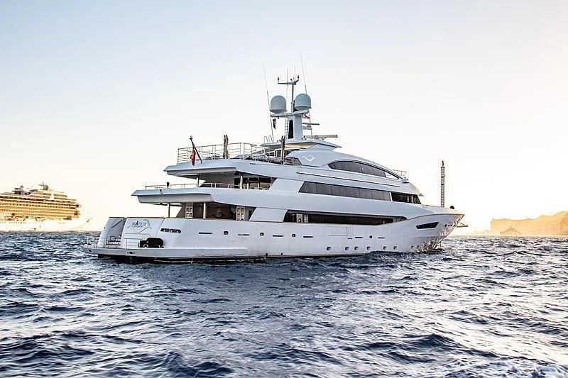 a white yacht on the water aboard BEATRIX Yacht for Sale